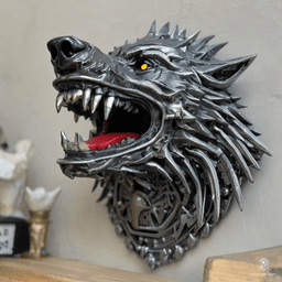 The metallic dire wolf roams the neon-lit streets of a cyberpunk world, its sleek grey body shimmering with an ethereal glow. With razor-sharp metal teeth and glowing eyes, it embodies the perfect blend of nature and technology, a fierce guardian of the city's dark underbelly.